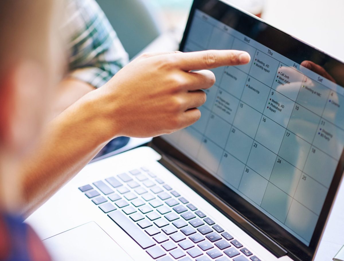 Production team discussing work schedule