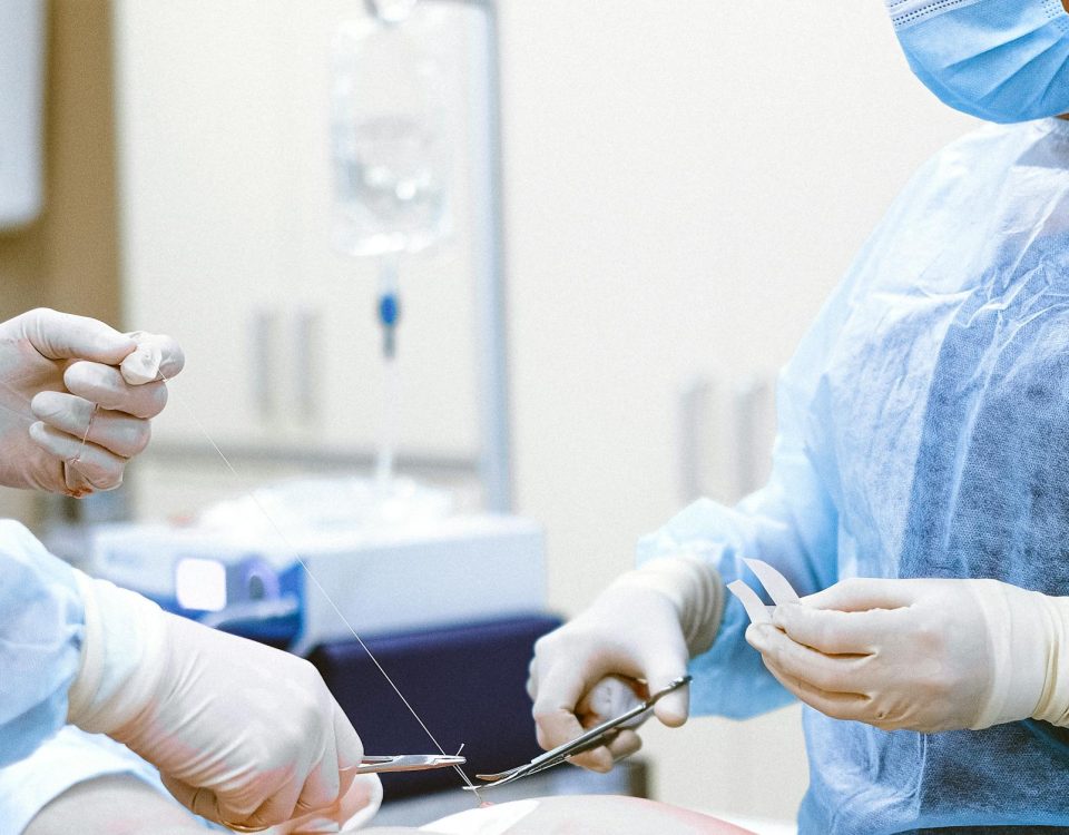 photo of medical professionals wearing personal protective equipment